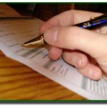 A person filling job application on the display
